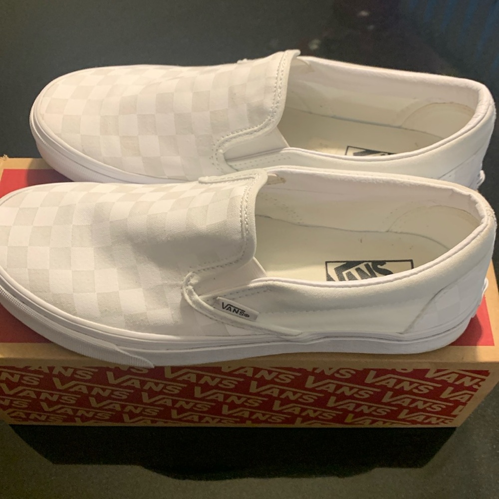 Woman’s size 9.5 slip on Van sneaker, Men’s size 8, unisex.